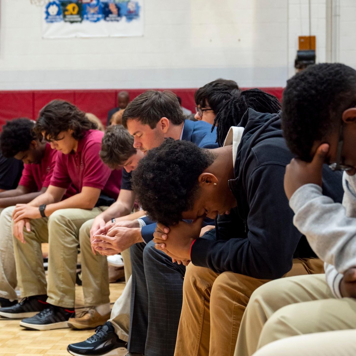 Celebration and faith bring Jubilee!  Students bow during a prayer for EHCS as we celebrate our 50th year.