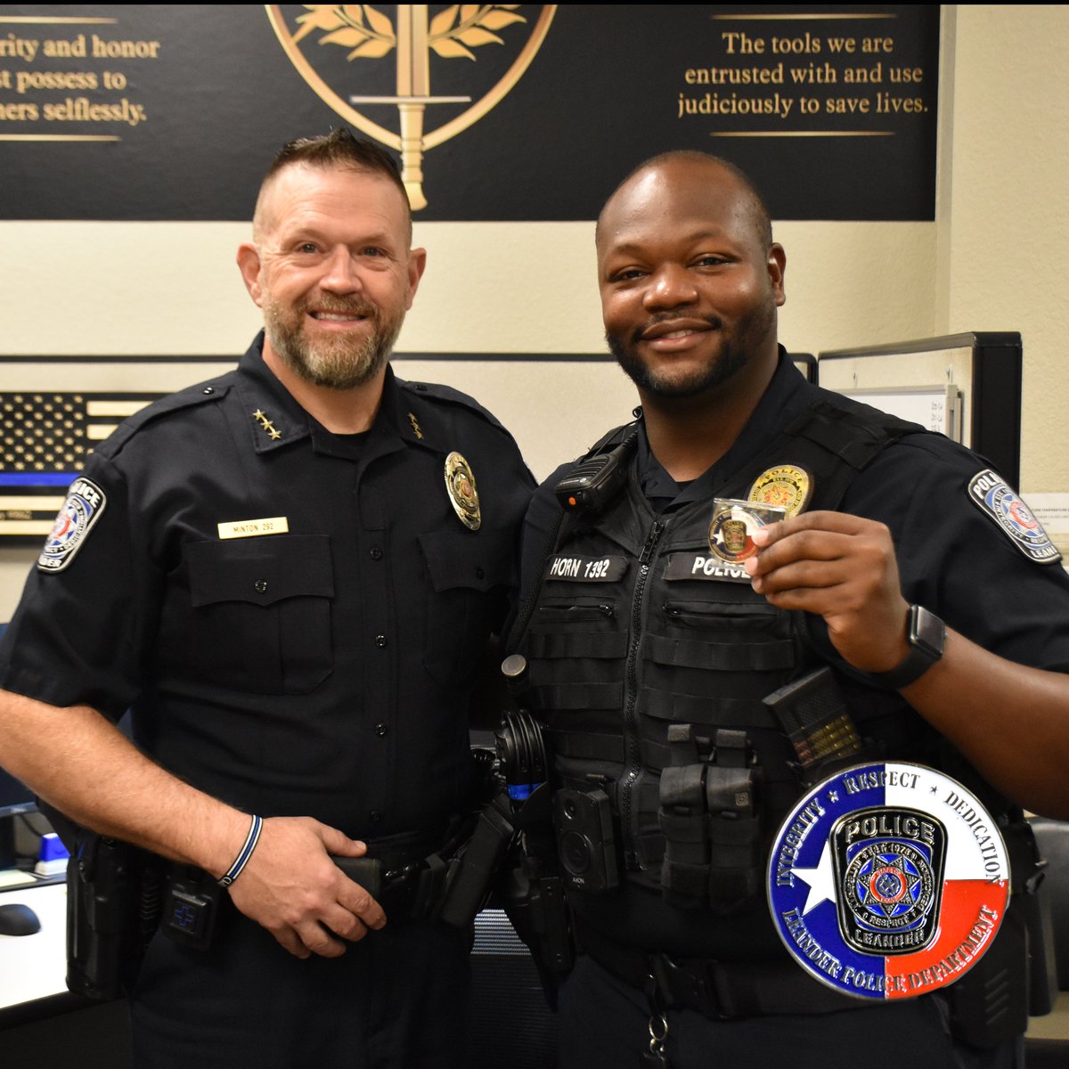 Today, Chief Minton had the pleasure of presenting Officer Horn with a Chief's Coin for going over and beyond the call of duty to serve, mentor, and guide a young man in need.  Ofc. Horn paid for a haircut, arranged a job interview, and provided transportation for this young man.