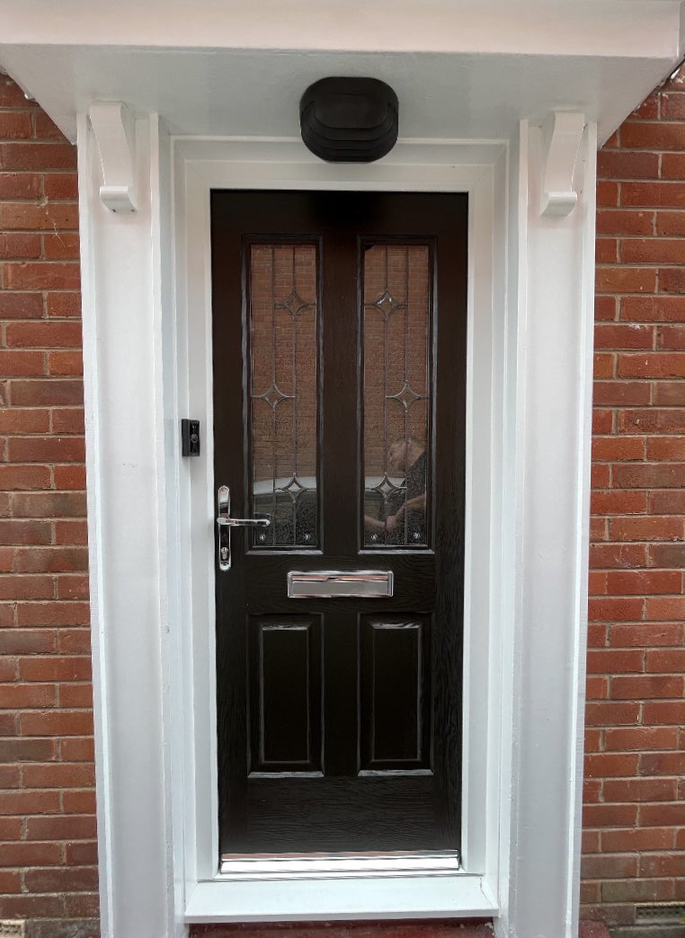 How smart does this beauty look in Greasby? We supplied and installed white Upvc double glazed REHAU windows with Georgian bar and a stunning black Rockdoor with white frame. 
Very swish!
0151 632 5550
hilbrewindows.co.uk
