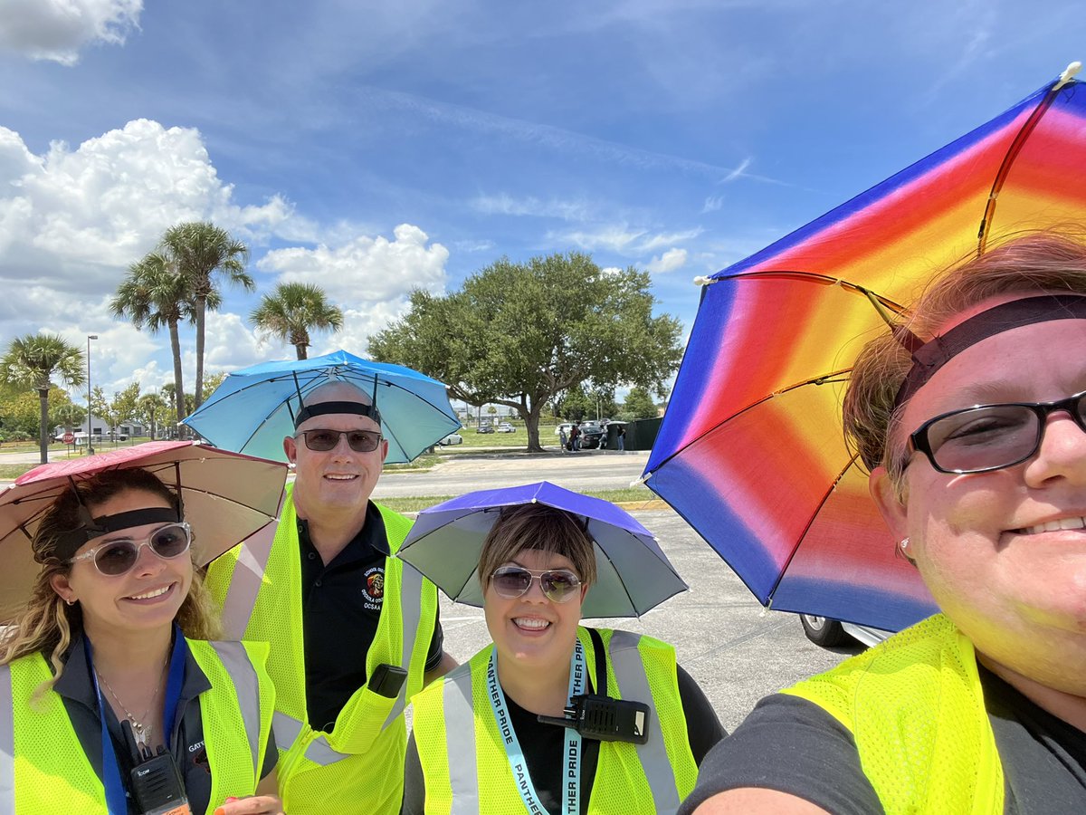 GatewayPanthers's tweet photo. 100 degrees won’t stop these #panthers! Umbrellas to keep them safe while they keep us safe! #ouradminrocks #justus #stylish #gatewayontherise https://t.co/r32w0wNNB4