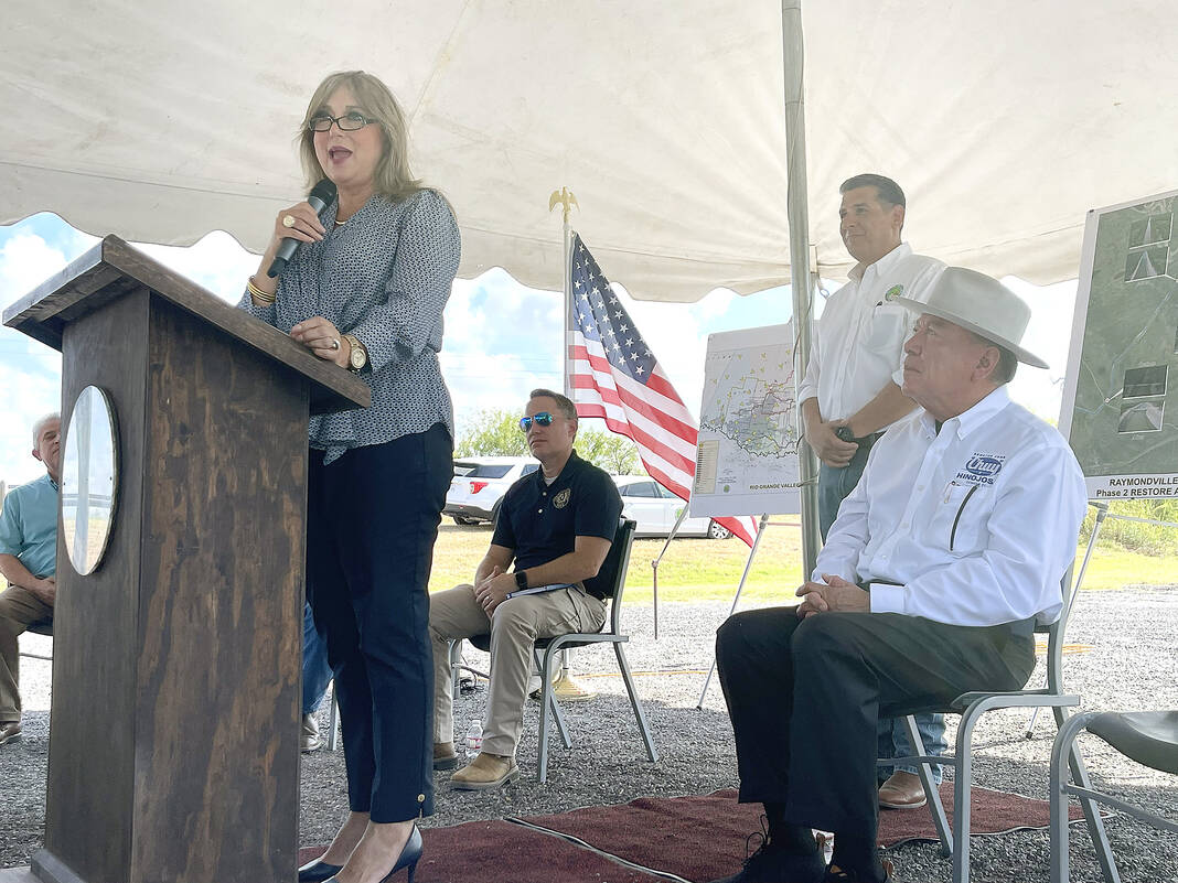 Hidalgo County Precinct 4 Commissioner Ellie Torres addresses the crowd during a groundbreaking for the Raymondville Drain project in eastern Willacy County on Friday.  (Photographer: Dina Arevalo)