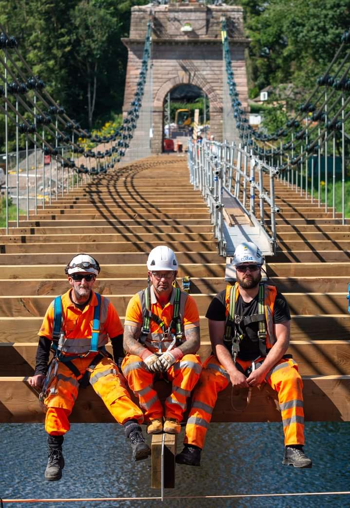 BuyFishersArms's tweet photo. Getting closer to joining Scotland again over the Union Chain Bridge . . . supporting beams are in place and the guys are beginning to put the  roadway down . . . 
#northumberland #morethanapub https://t.co/9gDNAo2wKZ