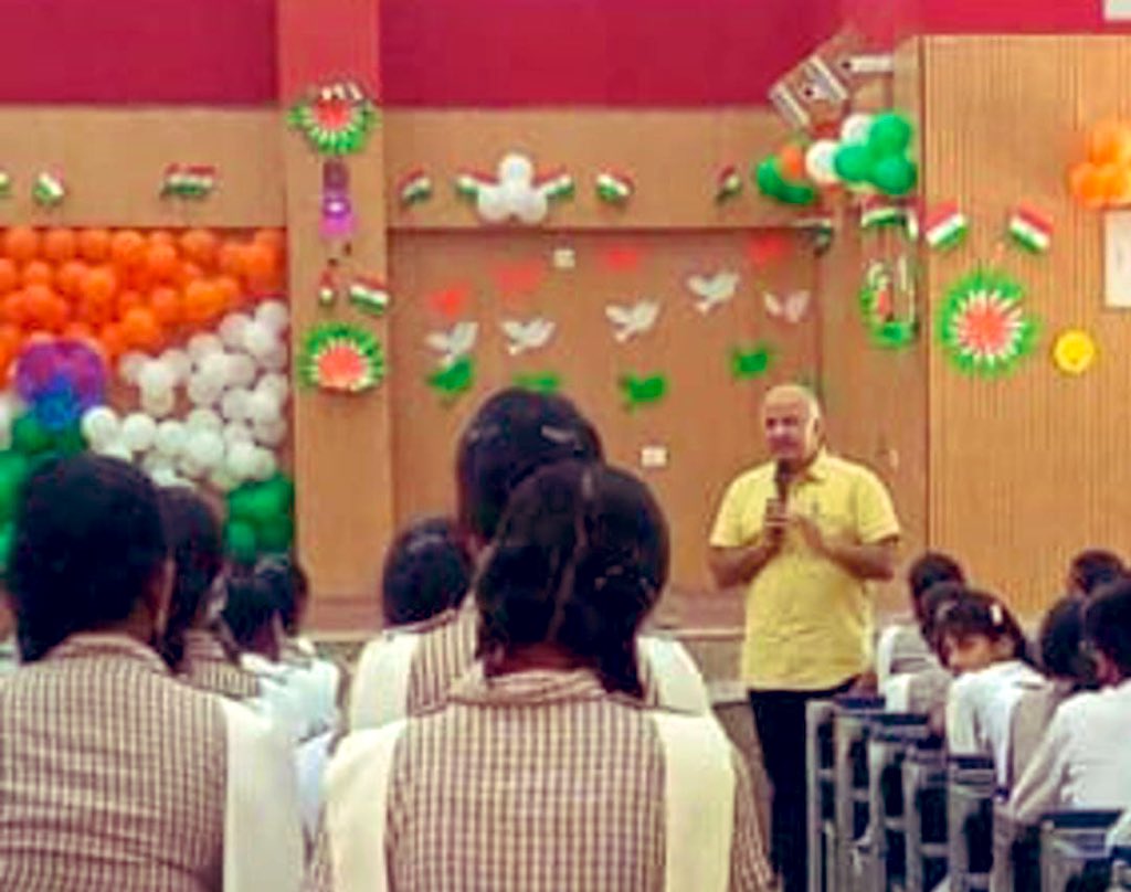Dir_Education's tweet photo. Dy CM @msisodia visited Shaheed Capt. Amit Verma, SV Inderpuri.

He distributed #Tiranga as part of the campaign #HarrHaathTiranga, to be celebrated on 14th Aug 2022 &amp; interacted with students about their Business Blaster ideas. 

He appreciated students' confidence &amp; enthusiasm. https://t.co/3Yrq3PKVkS