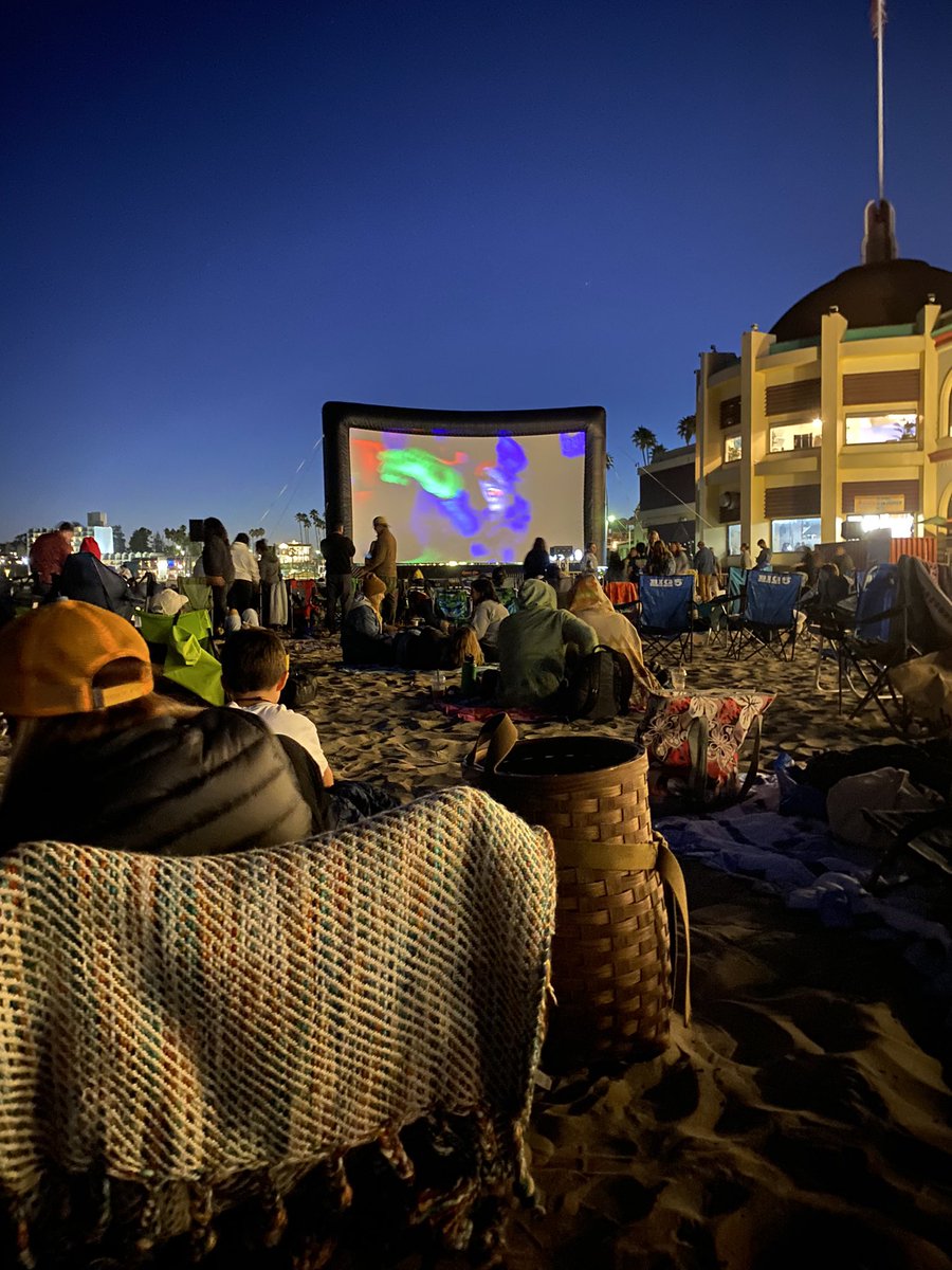 traceyssimmons's tweet photo. After a fun day at the boardwalk, @kennethcoane and I watched Ferris Bueller on the beach! The long exposure here makes the screen look funny. https://t.co/QshuuZPH7E