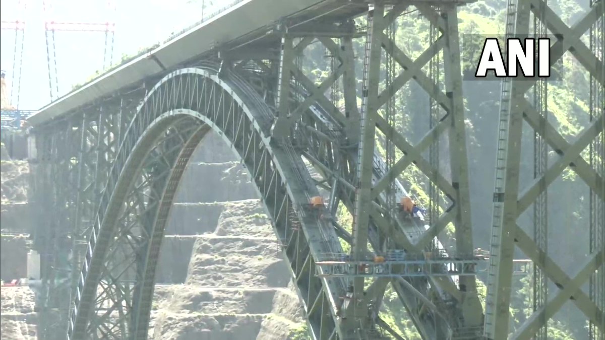 ANI's tweet photo. J&amp;K | Golden joint of world's highest Chenab railway bridge to be launched today

This has been a long journey. The term 'Golden Joint' was coined by civil engineers.... It's the world's highest railway bridge: Sanjay Gupta, Chairman &amp; MD, Konkan Railway https://t.co/BxAss9BtWf