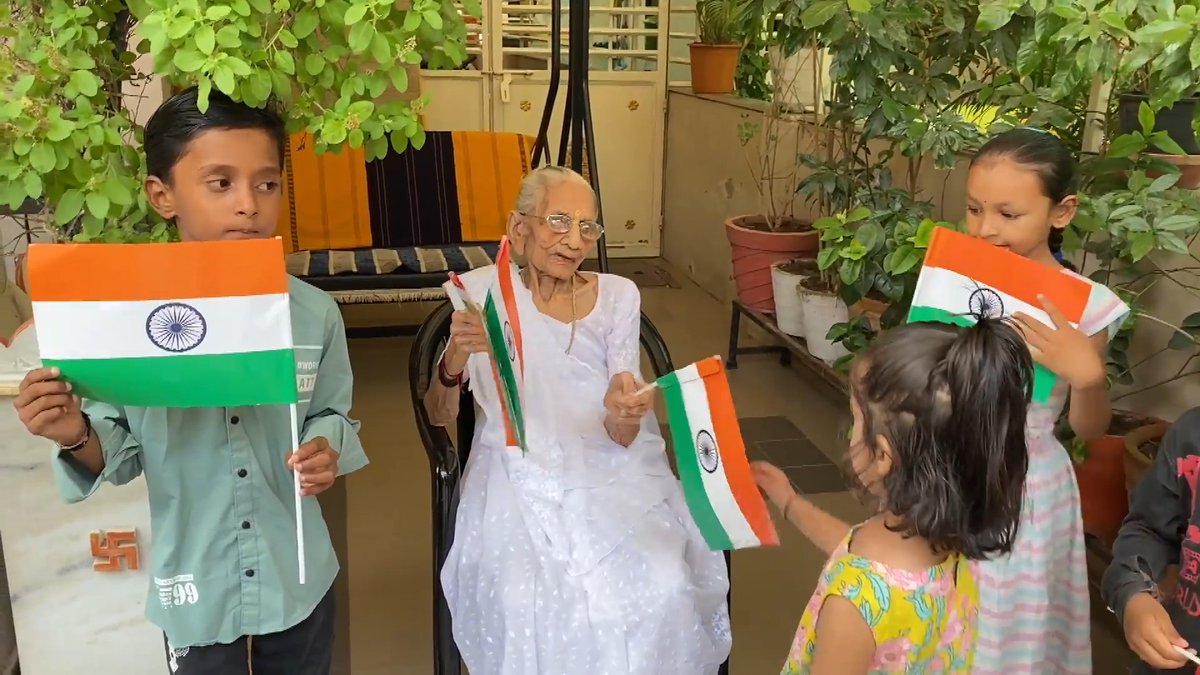 Hiraba giving flag to a girl