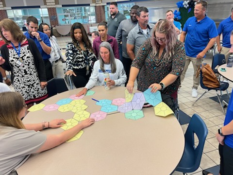 ClearSpringsHS's tweet photo. Making connections. Teachers learning instructional strategies to use in the classroom. Hexagonal thinking on a grand level! #ChargersLearn #ChargerWay https://t.co/r2p0ar0MMq
