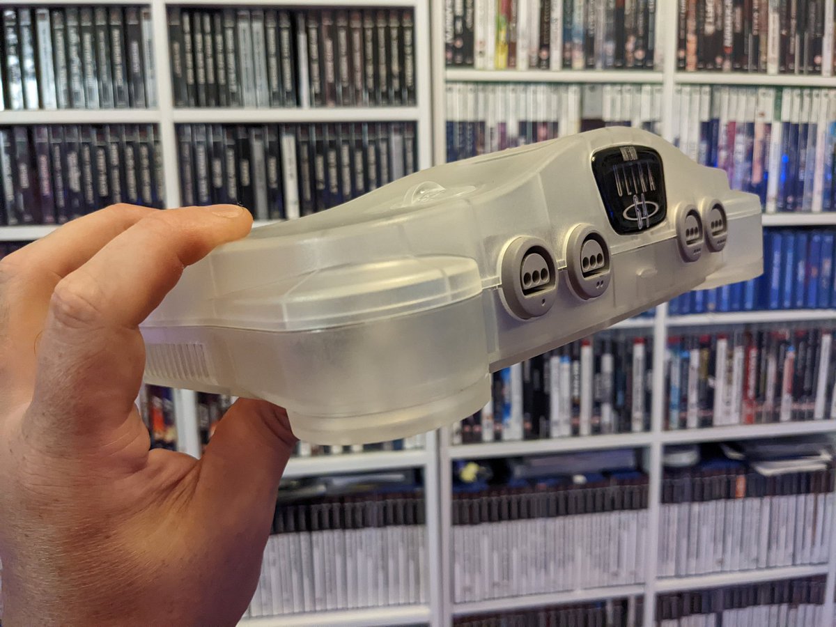 SimplyAustins's tweet photo. My stock PAL N64.  Treated it to one of the new shells and badge!

Turned out a treat, I think the white transparent looks good. 👌 https://t.co/FTfrYI96C3
