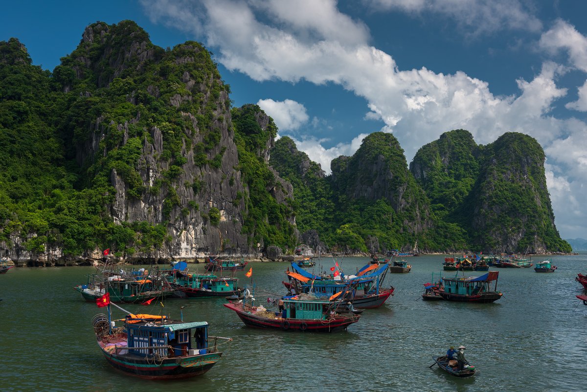 At the promenade in Hong Gai, overlooking the fishing fleet and the backdrop to the start of Halong Bay.