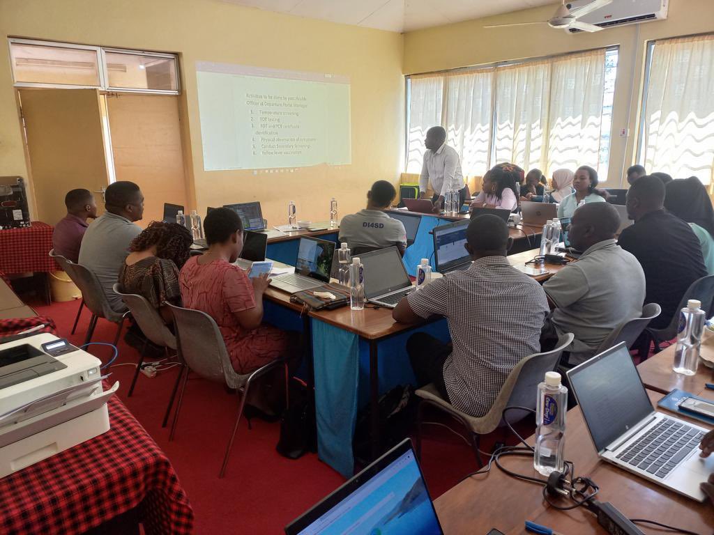 udsmdhis2lab's tweet photo. #KnowOurProject 
 @udsmdhis2lab team conducted a demonstration session with port health officers and presented an improved Afyamsafiri system. The improved version aims to solve existed challenges including addition of departure and yellow fever booking functionalities https://t.co/NrM9SkDsrl