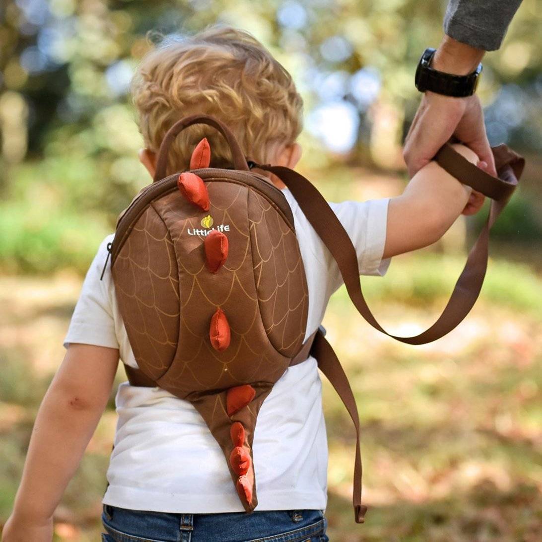 Fledglings's tweet photo. A holiday tip for parents of children who like to run off with little sense of danger: invest in these walking reins! We sell them on their own, attached to adorable backpacks, or stronger reins with a chest pad and waist belt for extra safety 👉 https://t.co/hN8wU9ELBL https://t.co/4gEZJmCkRV