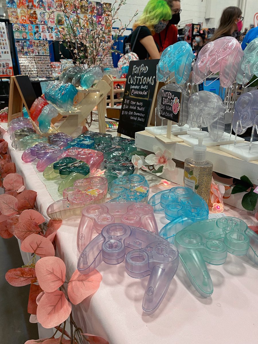 littleteafox's tweet photo. some pictures from yesterday but we are still set up at super smash con (-: been feeling anxious lately but everyones been amazing

some designs sold out!! 

@OkamiSwan and @ghoulrunnings are also set up here this weekend and are running out of stock so please stop by 💖 https://t.co/BBrP1Bebro