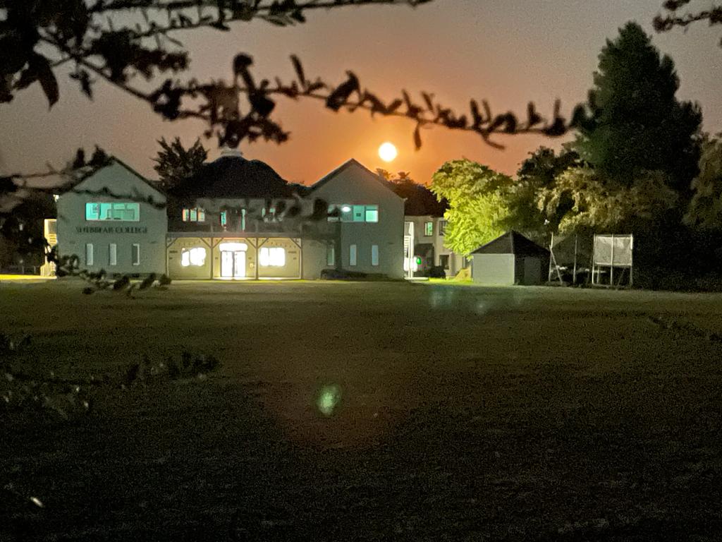 ShebbearCollege's tweet photo. The newly named Saltmarsh Centre - named after our outgoing Chair of #Governors Mike Saltmarsh, who is retiring after an incredible 30 years on the Governing Board and 28 years as Chair - looking very pretty in the #moonlight last night! (📸 by Mr Jenkins!) #devonsunset #fullmoon https://t.co/0lul4U8yGF
