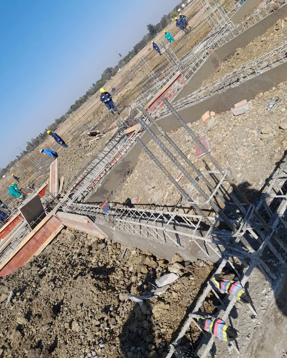alproprojects's tweet photo. Ground Beams are structural beams designed to transfer loads along there length to span between to walls, columns, piles or padstones. Pokugara Estate project progress. #propertydevelopment 
#groundbeams #padfoundations #realestate #estate #construction #propertyinvestment https://t.co/nrYgPgV9Iz