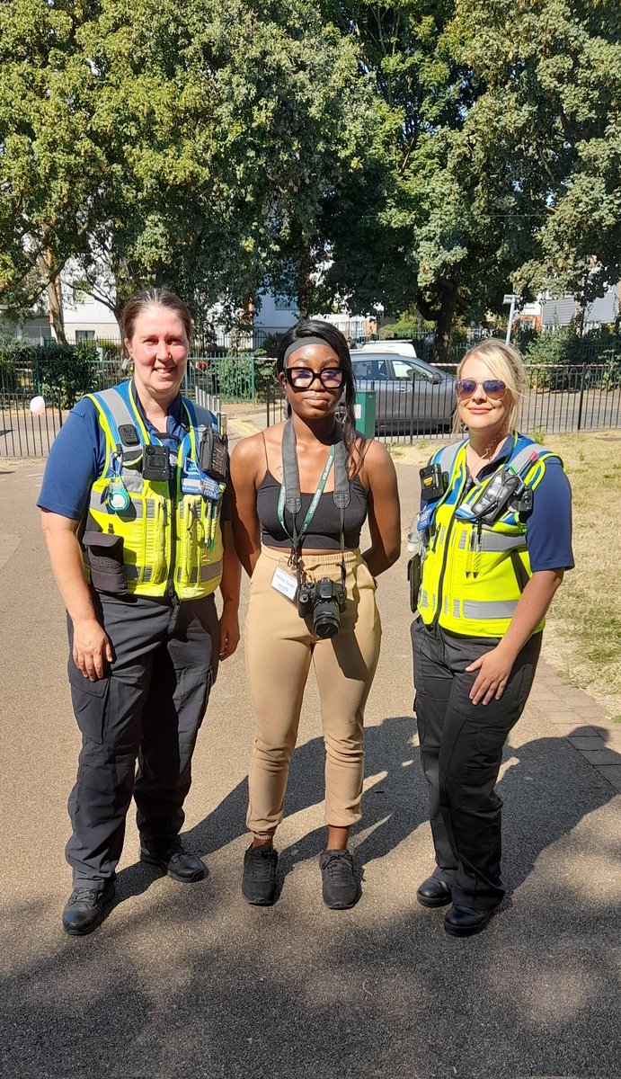 Police officers taking photos  with your  young  people.
