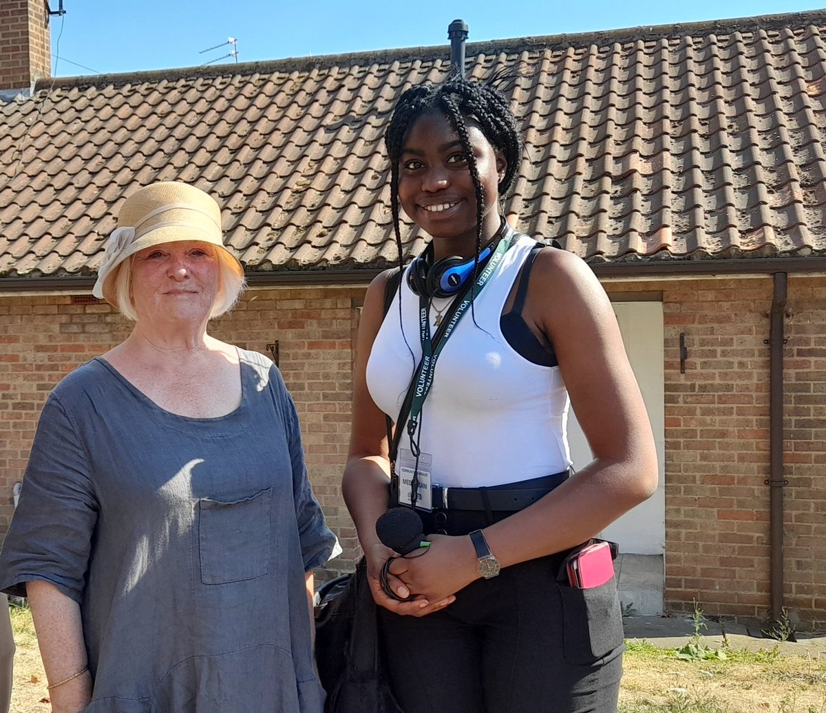 Cllr Stone alongside young volunteer.