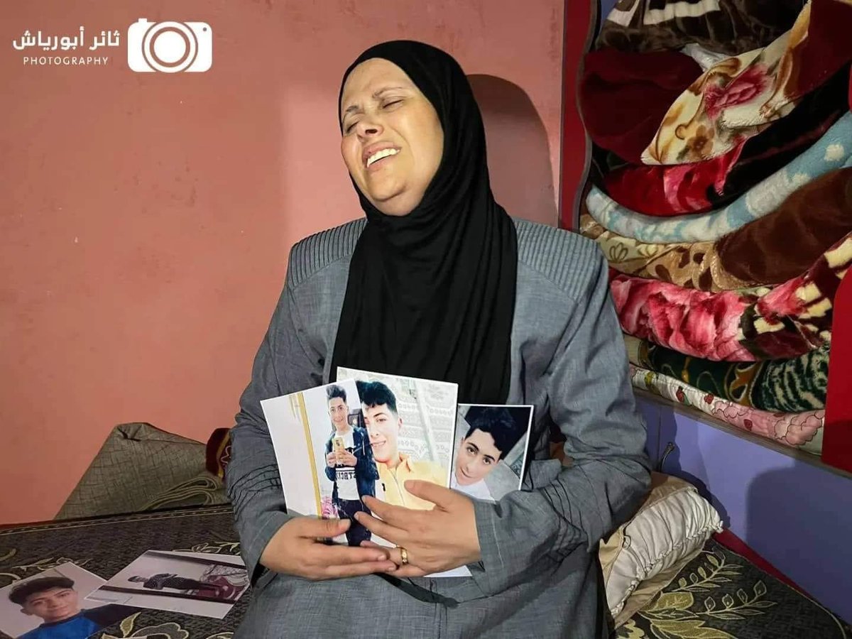 OnlinePalEng's tweet photo. Palestinian mother Najwa Abu Hamadeh still can't endure the pain after her only child, Khalil, was murdered in an Israeli air strike during Israel's most recent attack on Gaza. https://t.co/huyBxgAk27