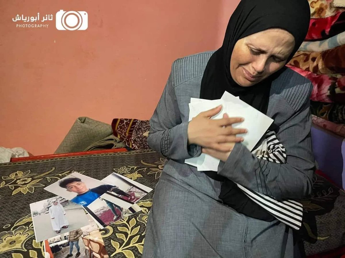 OnlinePalEng's tweet photo. Palestinian mother Najwa Abu Hamadeh still can't endure the pain after her only child, Khalil, was murdered in an Israeli air strike during Israel's most recent attack on Gaza. https://t.co/huyBxgAk27