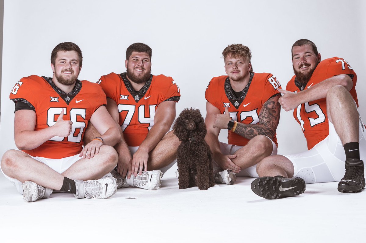 CowboyFB's tweet photo. When Dolly Parton steals the show at photo day 🐶

#DAT | #GoPokes https://t.co/jxa6lCCRuS