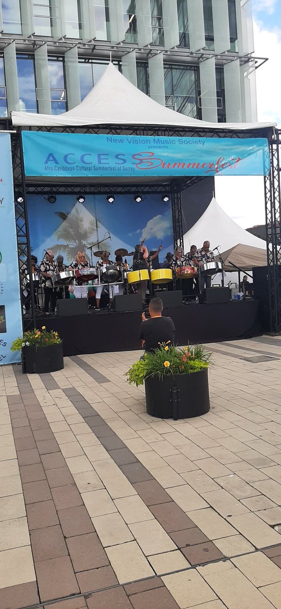 RamonBandong's tweet photo. Come down to #SurreyBC Civic Plaza and partake of the joyous, glorious songs of Inclusivity and Acceptance on steet drums at Afro Caribbean Summerfest of Surrey @jinnysims @SurreyForward @RamonBandong https://t.co/NcMn9e7N5i