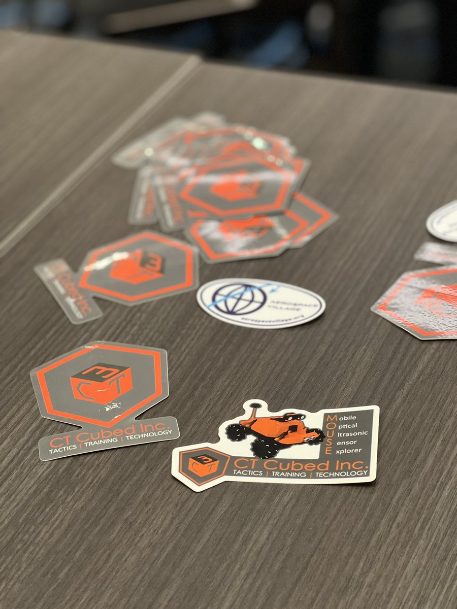 CTcubed's tweet photo. We’ve got #stickers in the #AerospaceVillage @SecureAerospace get them before they run out. @defcon @dcstickerswap #DEFCON30 Learn about the MOUSE ➡️ https://t.co/0E6ehX5dkK https://t.co/ZRMEEgKmBX