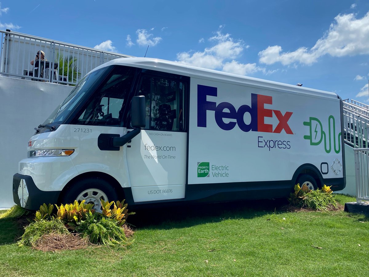 FedEx's tweet photo. Fans at @FedExChamp are getting an up close look at one of our BrightDrop Zevo 600s. This vehicle is a part of Priority Earth, our goal to deliver a more sustainable future. https://t.co/E46UFhFwkx