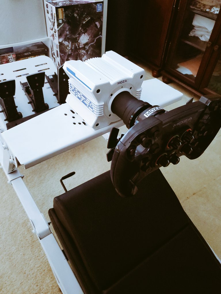 Laxr_'s tweet photo. Got that @moza_racing ecosystem to go off track even more.

GS Wheel
SR-P Pedals
White @nextlvlracing F-GT cockpit to match the White R9 base. https://t.co/Zc7dguCBWo