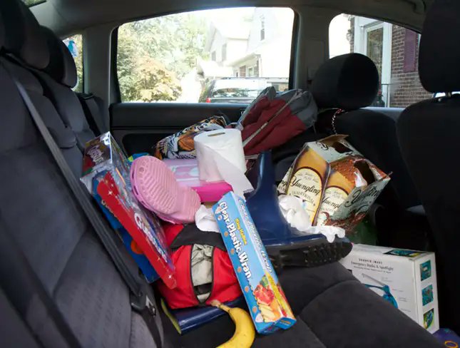 TheOnion's tweet photo. You Can Just Push Shit In Back Seat Out Of Way https://t.co/ON6pw4IWuI https://t.co/eabNPCFejk