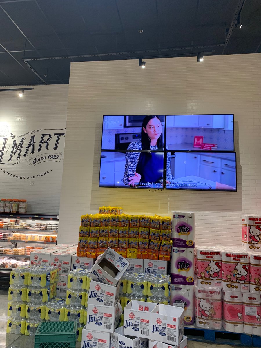 Did not expect to see <a href="/Jbrekkie/">Japanese Breakfast</a> on the screen at my  <a href="/hmartofficial/">H Mart</a> , loved her book 📖 though! 😭🥰