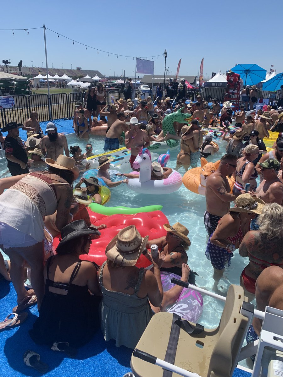 WillLesterPhoto's tweet photo. I’d say the pool is a bit crowded at #tailgatefest @AutoClubSpdwy in Fontana this afternoon. https://t.co/DlONjEsTtN