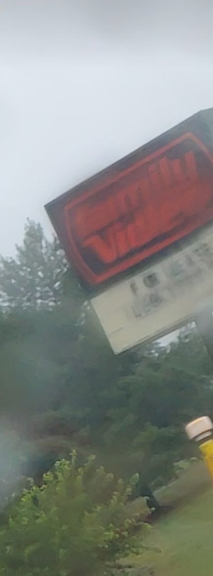 music_4_crying's tweet photo. Apologies for the "proof of bigfoot"-quality photo, but this is just a reminder for Strangers Things fans that Family Video isnt solely a relic of the 80's and it only went out of business in the last year https://t.co/BNZp2nV991