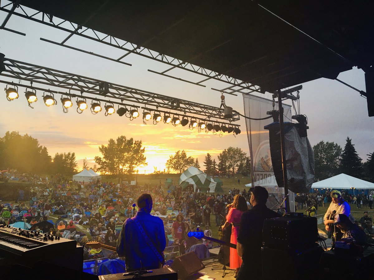 GrantStovel's tweet photo. After a tempestuous early evening, the rain relents, the clouds break, and ⁦@thedionetaylor⁩ caps off her spirited ⁦@BearCreekFolk⁩ Main Stage to a soulful sunset and a golden glow. Magic!! https://t.co/7ZIjRH3ZA6