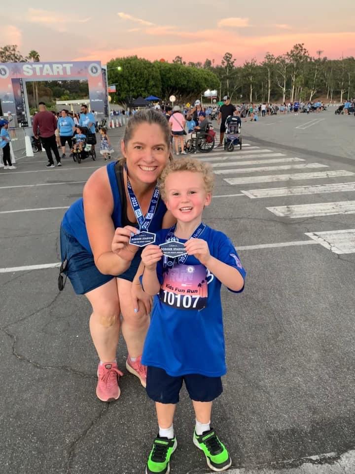 @DodgersFdn he’s so proud of his medal he showed everyone. My first 5k. His first kids run! #Dodgers #sunsetrun