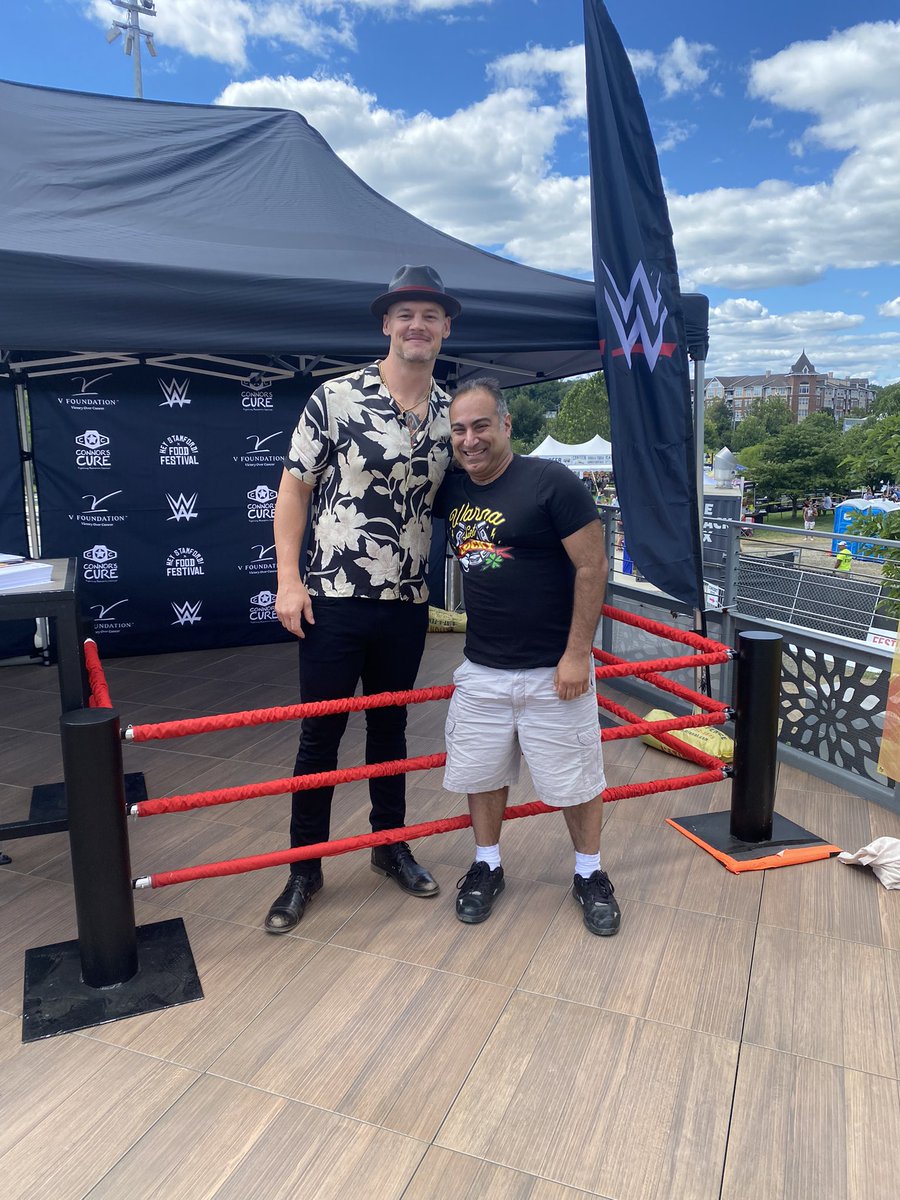mikerandcom's tweet image. What an honor it was to finally get to meet my favorite wrestler @BaronCorbinWWE today! Had to take pics with him in both my #WannaGetLucky t-shirts &amp;amp; got to help support the Connor’s Cure foundation in the process! #HappyCorbin #BaronCorbin #WWE #SmackDown