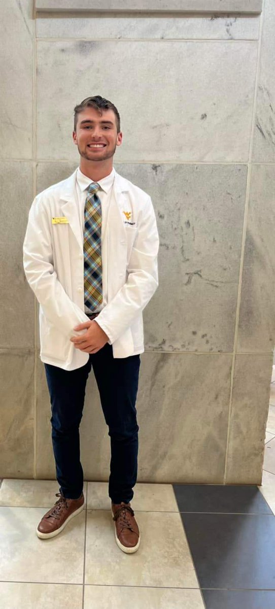 mccortbaseball's tweet photo. Congratulations to @samnewcomer13 ('20) on receiving his White Coat at WVU School of Pharmacy https://t.co/NGOoj9xXyM https://t.co/fhSA6jIcse