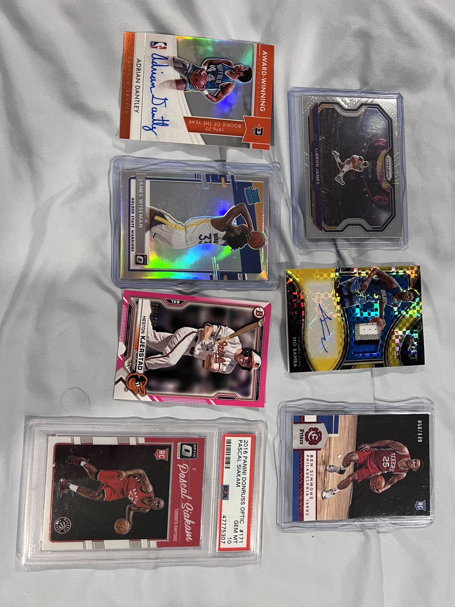 The2HitmAkerZ's tweet photo. Lebron tribute 
Mo Bamba patch auto /10
Ben Simmons rookie /149
Adrian Dantley ROY auto 
Wiseman optic holo 
Kjersted pink /299
Gem mt 10 siakam optic Rc

Must go, first offer takes them all https://t.co/AE1gIoKEOp