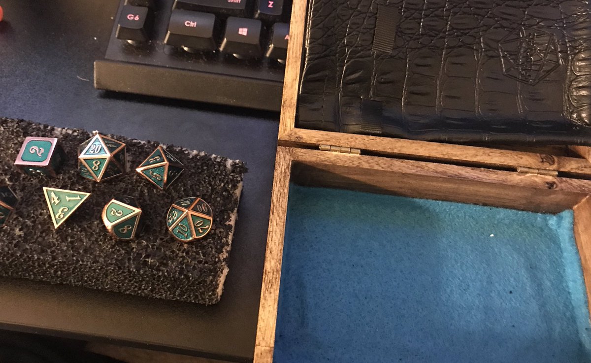 A good friend made this awesome dice bag/dice box/roller as a groomsmen present. Dice included.
