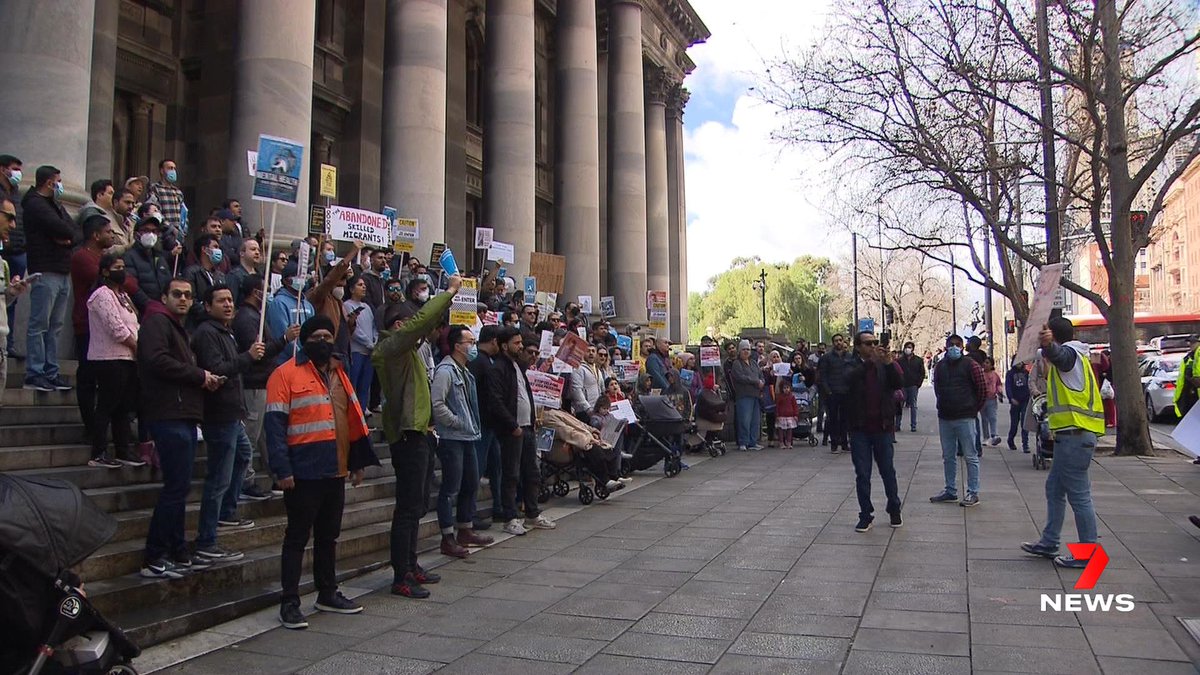 7NewsAdelaide's tweet photo. Migrants have marched through the CBD to the steps of Parliament House, protesting the slow processing of 887 visas. The backlog is so heavy, applications submitted prior to September 2020 are currently being assessed. 7NEWS Adelaide at 6pm | https://t.co/8ftPfFYTVQ #7NEWS https://t.co/ehmzh8P2vh