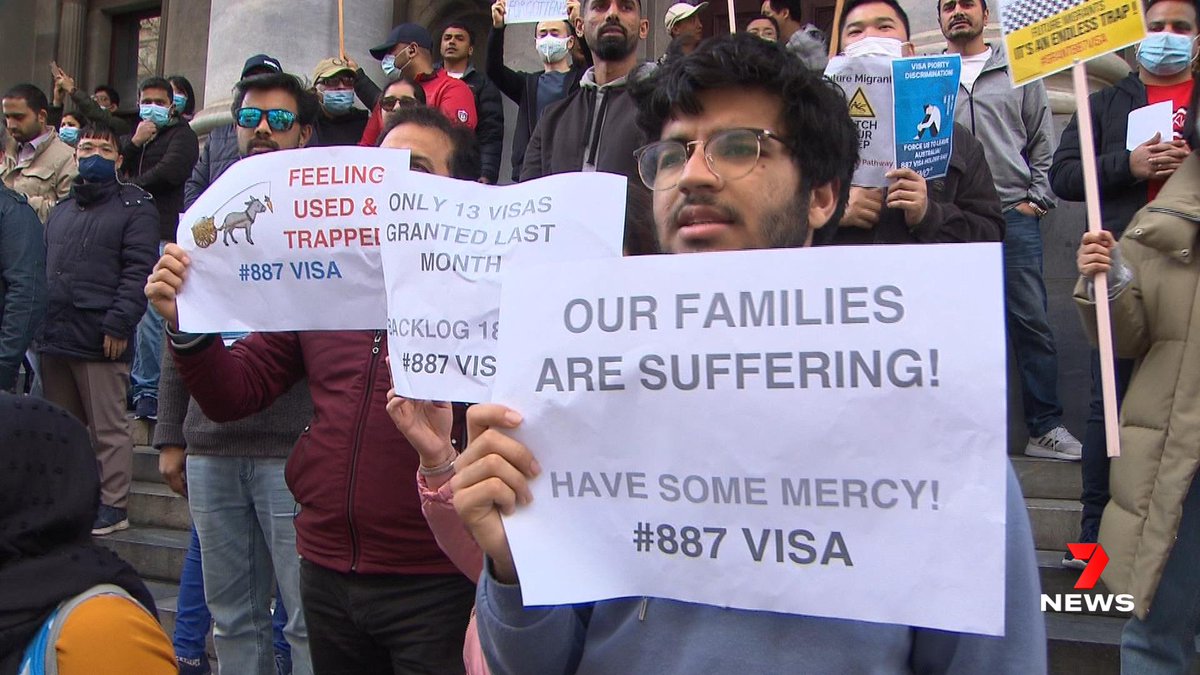 7NewsAdelaide's tweet photo. Migrants have marched through the CBD to the steps of Parliament House, protesting the slow processing of 887 visas. The backlog is so heavy, applications submitted prior to September 2020 are currently being assessed. 7NEWS Adelaide at 6pm | https://t.co/8ftPfFYTVQ #7NEWS https://t.co/ehmzh8P2vh