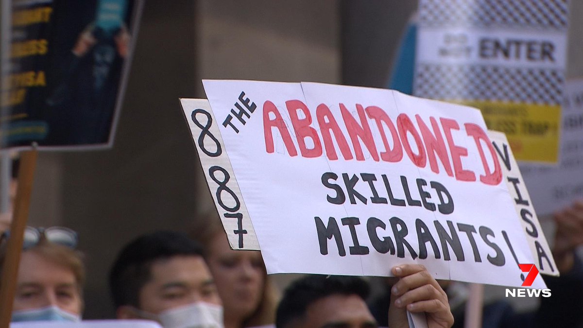 7NewsAdelaide's tweet photo. Migrants have marched through the CBD to the steps of Parliament House, protesting the slow processing of 887 visas. The backlog is so heavy, applications submitted prior to September 2020 are currently being assessed. 7NEWS Adelaide at 6pm | https://t.co/8ftPfFYTVQ #7NEWS https://t.co/ehmzh8P2vh