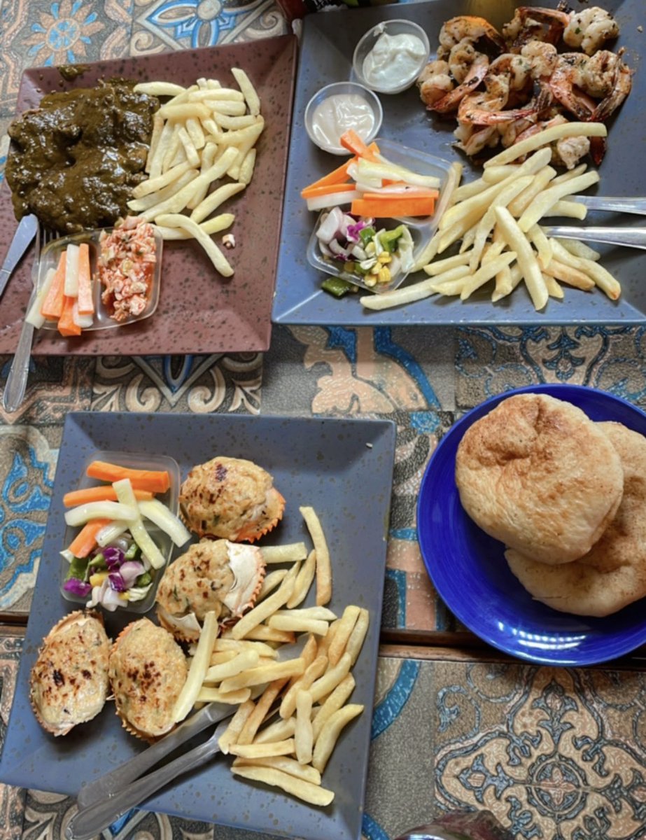 DrNupurrk's tweet photo. Good times 🥂🍤🌊
Baked crab, chicken cafreal n grilled Prawns 
#FoodieMe #Brunchscenes #Goa https://t.co/sTYsbfTXL0
