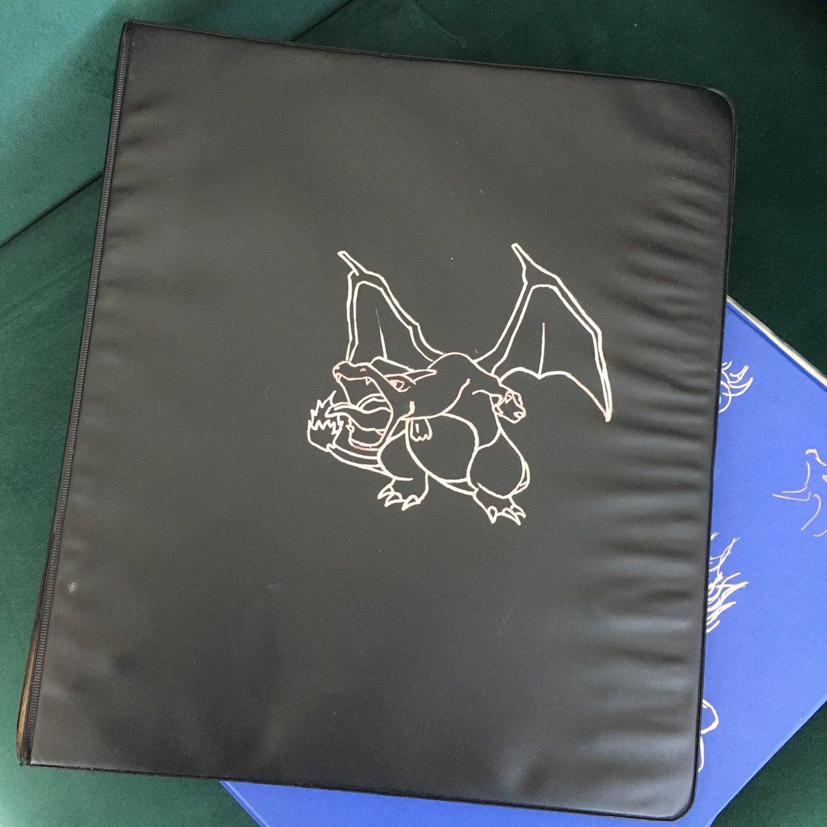 andypoondesign's tweet photo. When I was 13 (26 years ago) I would buy these blank binders for $1, draw Pokèmon on the cover and sell them for $9 a a local food court.I guess I’ve been hustling for awhile! @pokemon #bootleg #charazard #metallicpens #traditionalart #custombinders #backtoschool #arthustle https://t.co/zCsgAqNWqD