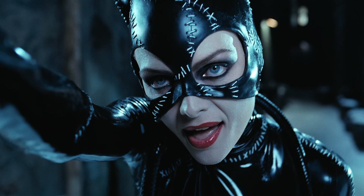 pixy (픽시) ‘bewitched’ (eng version) mv , dir. hong jaehwan (2021) / catwoman in batman returns , dir. tim burton (1992)