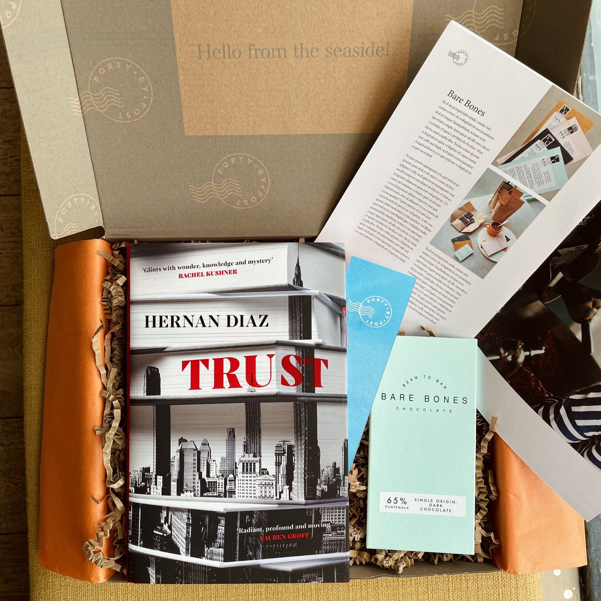 Our September #PortyByPost fiction box features the incredible Trust by Hernan Diaz! Subscribers will receive a signed first edition book &amp; access to our online event with Hernan on Wed 21/09. Plus, a bar of delicious chocolate from <a href="/bareboneschoc/">Bare Bones Chocolate</a>! portybypost.com/fiction