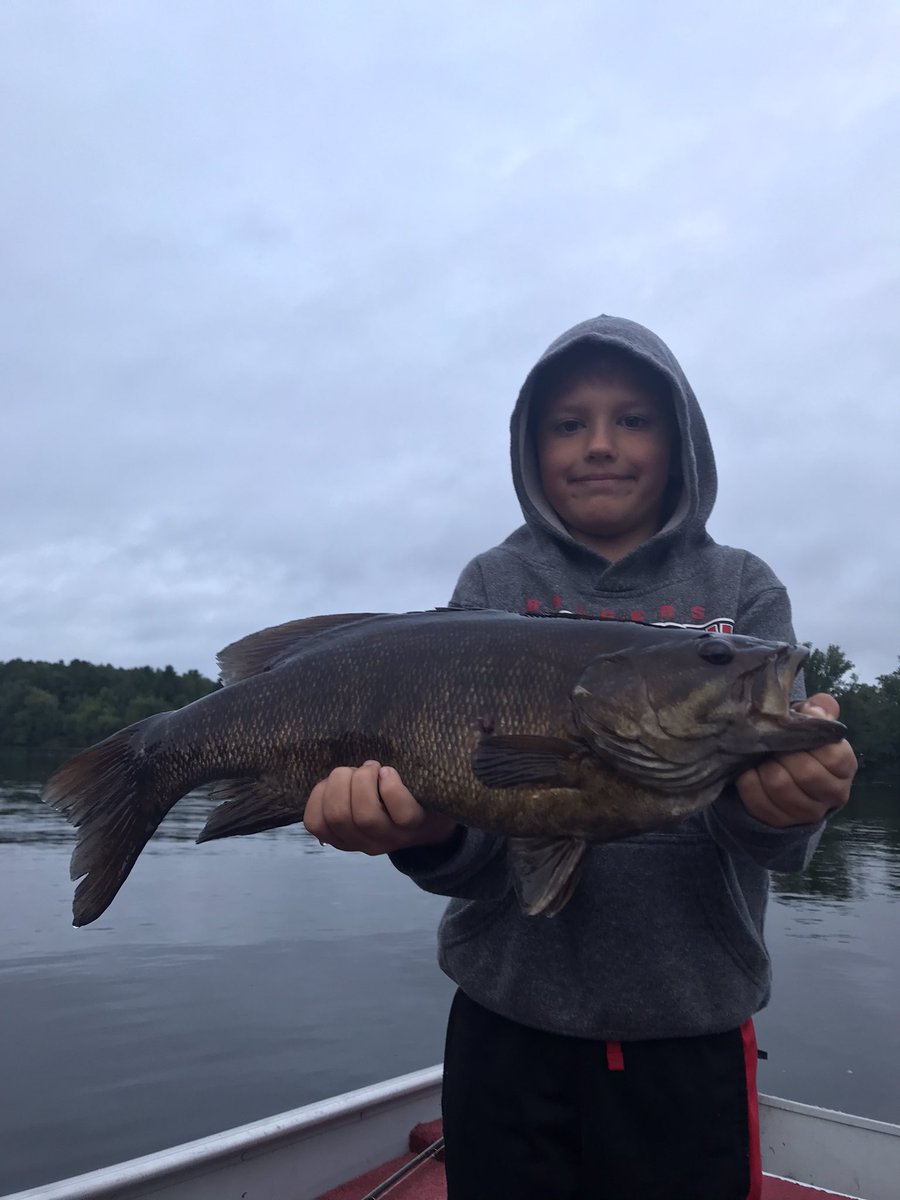 AaronKatzmarek's tweet photo. 21.5 big fat wisconsin river smallie for this young buck.  New family record #smallmouth and he’s ready to tell everyone about it
#wisconsin #fishing https://t.co/1R28phE78d