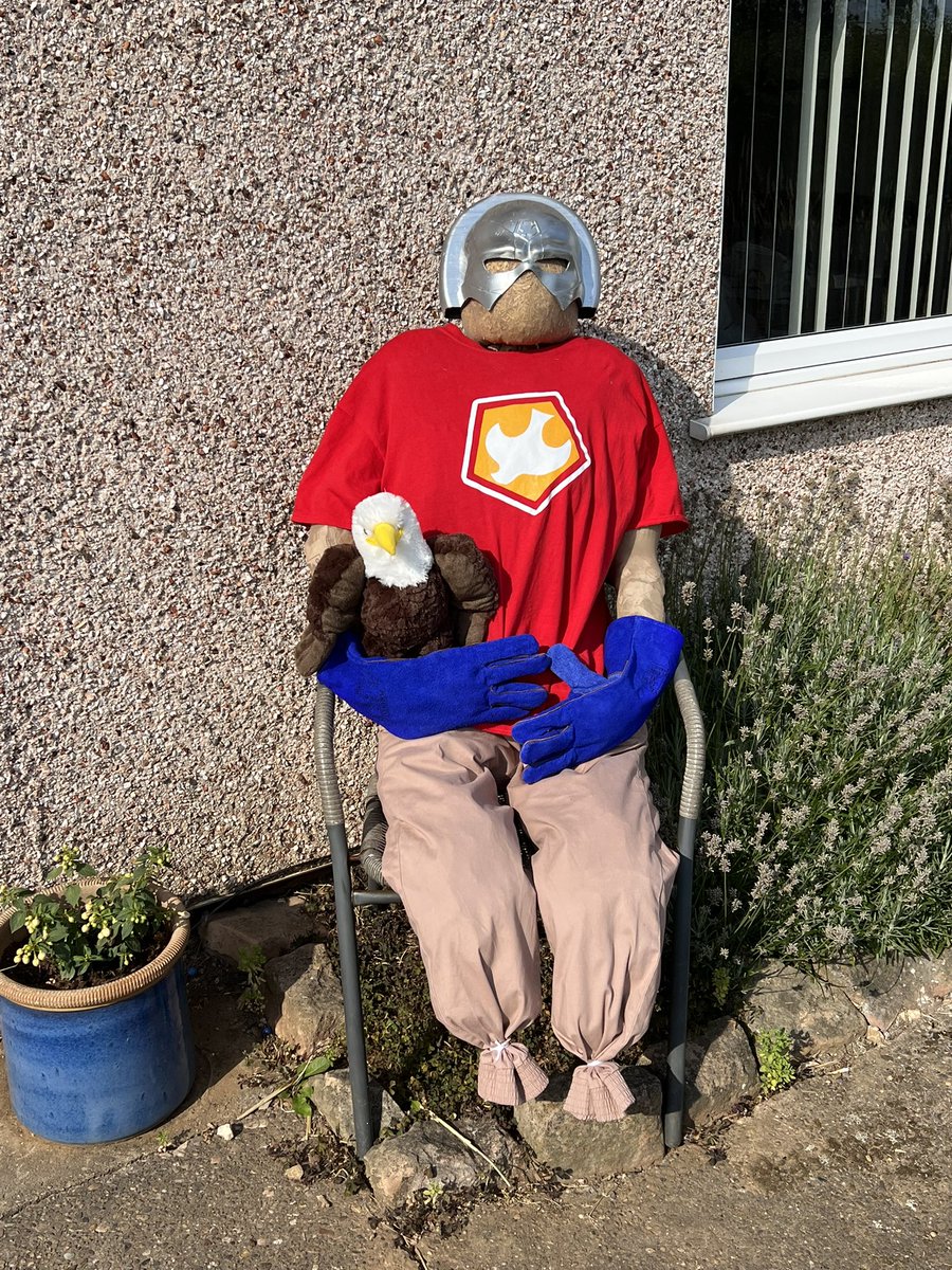 OwenHartFan1's tweet photo. Our village scarecrow festival contribution! #peacemaker and #eagley have shown up. @JohnCena https://t.co/62sZeRng6T