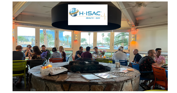 HealthISAC's tweet photo. Health-ISAC Members connected at a Member Meetup dinner at BlackHat / DEFCON in Las Vegas for some lively conversation. Who won the collector's 2020 "DEFCON is canceled" coin? https://t.co/jH67abRCFn #healthit #DEFCON22 #blackhat22 https://t.co/fzHW9EwVe2
