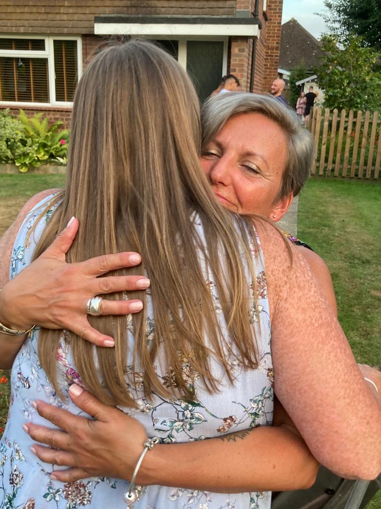 minimaggs08's tweet photo. Someone caught this moment on camera - me and my cousin (we were celebrating her 50th) - I absolutely love it. https://t.co/bJokpfbOdO