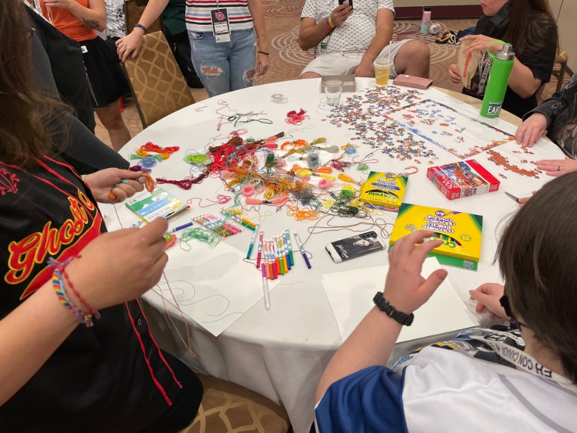 TeachEarp_'s tweet photo. So much happy crafting happening in the @EHConCanada  Earper Experience room! Come hang out and make a bracelet, play a game, write a card for our @earpitforward project, or just take a chill break from conning! We’re open until the closing ceremony! 😊 https://t.co/RXIQSfY8EE