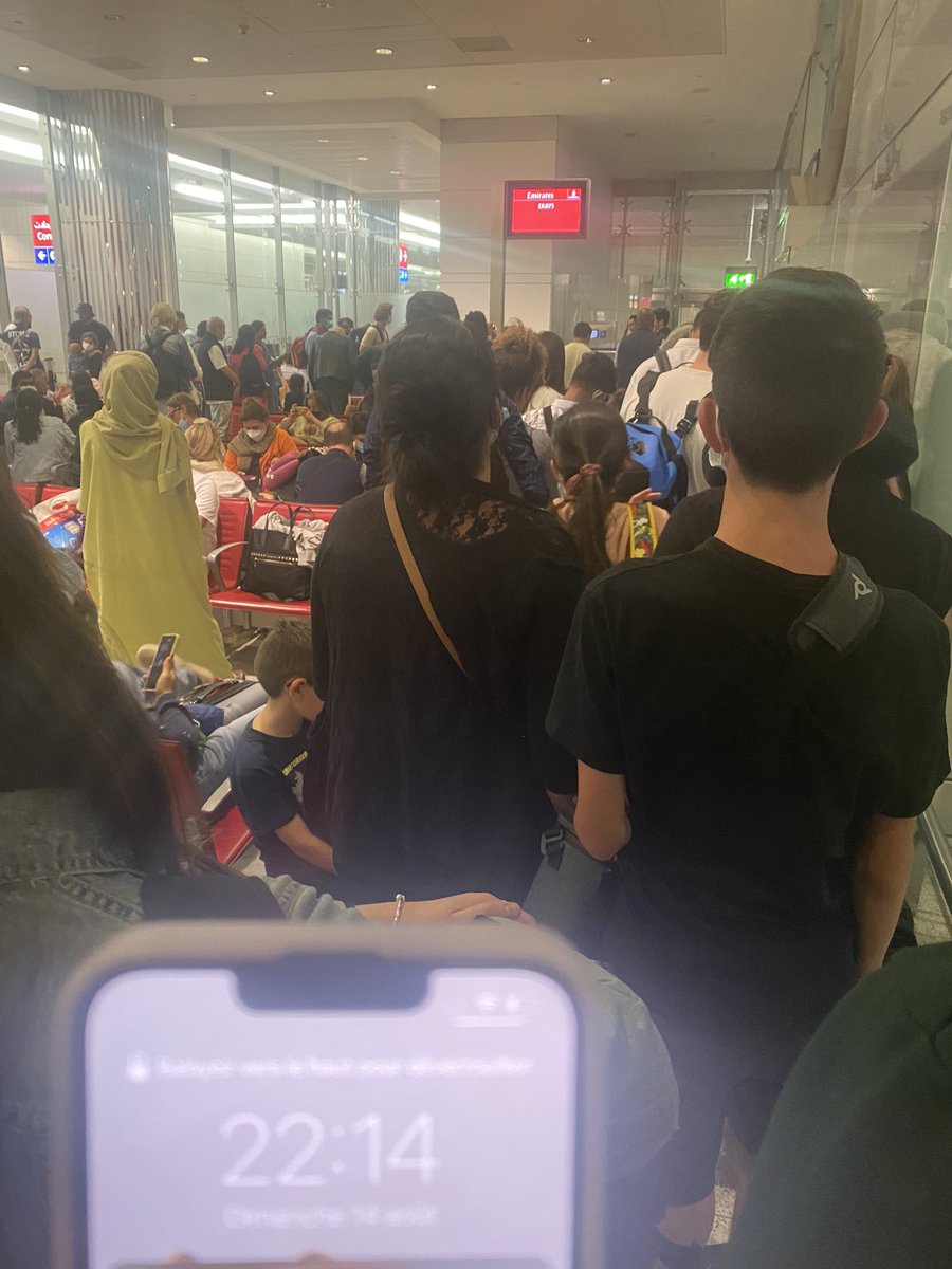 MaximeGluck's tweet photo. @emirates @EmiratesSupport our flight was planned at 2:40pm today to Paris, with no information since the beginning, it’s now almost 10:30pm and still nothing… some people are in the airport for 17 hours. Nightmare ! At least, communicate ! #emirates #dubai #paris #nightmare https://t.co/PQSkI4rC4n